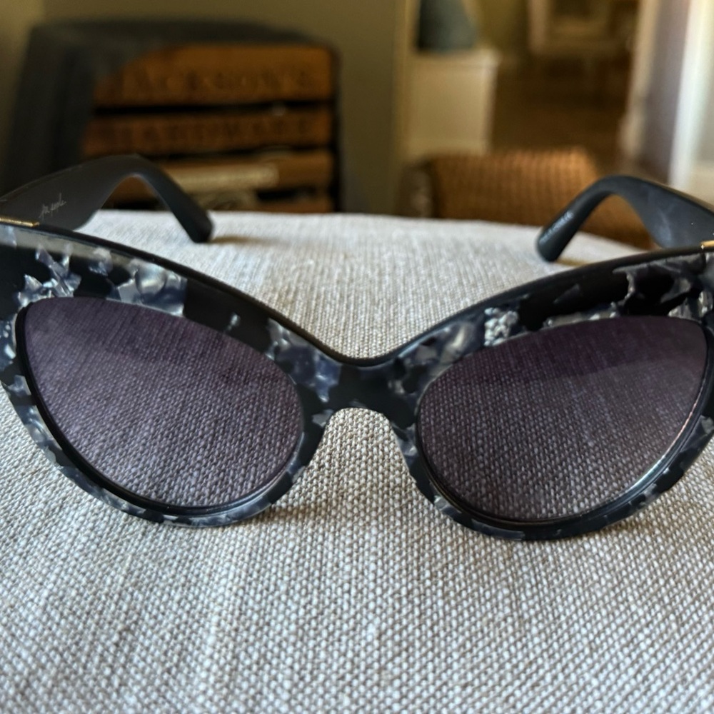 Beautiful woman’s sunglasses